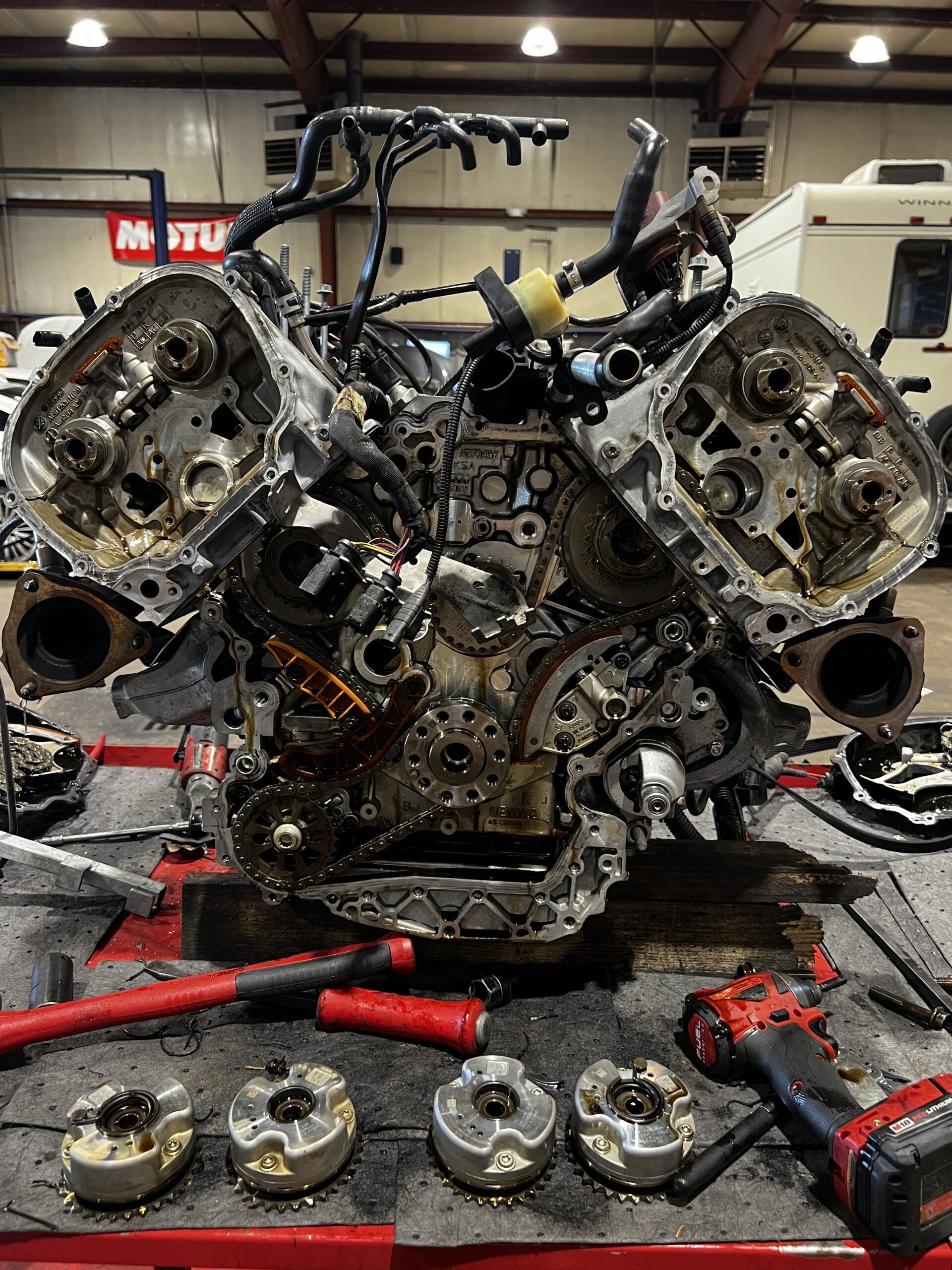 Audi V8 engine assembly with camshafts and timing chains at Euro repair shop