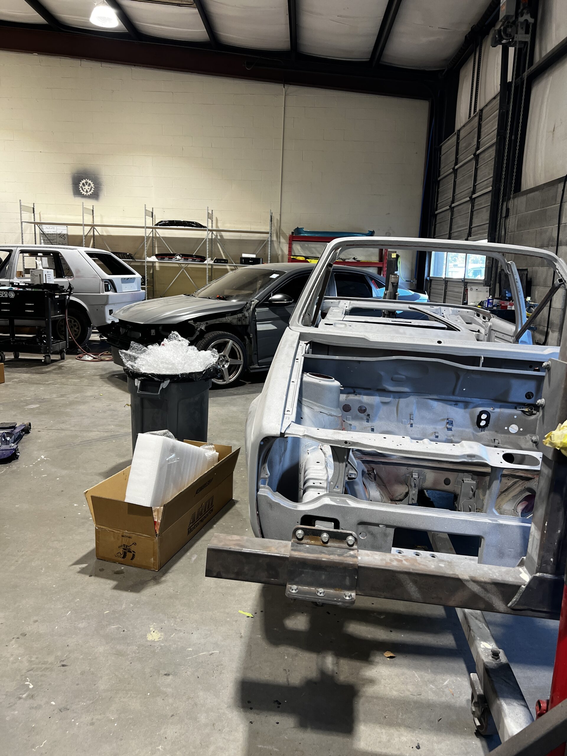 Euro repair shop: VW Golf undergoing restoration in garage